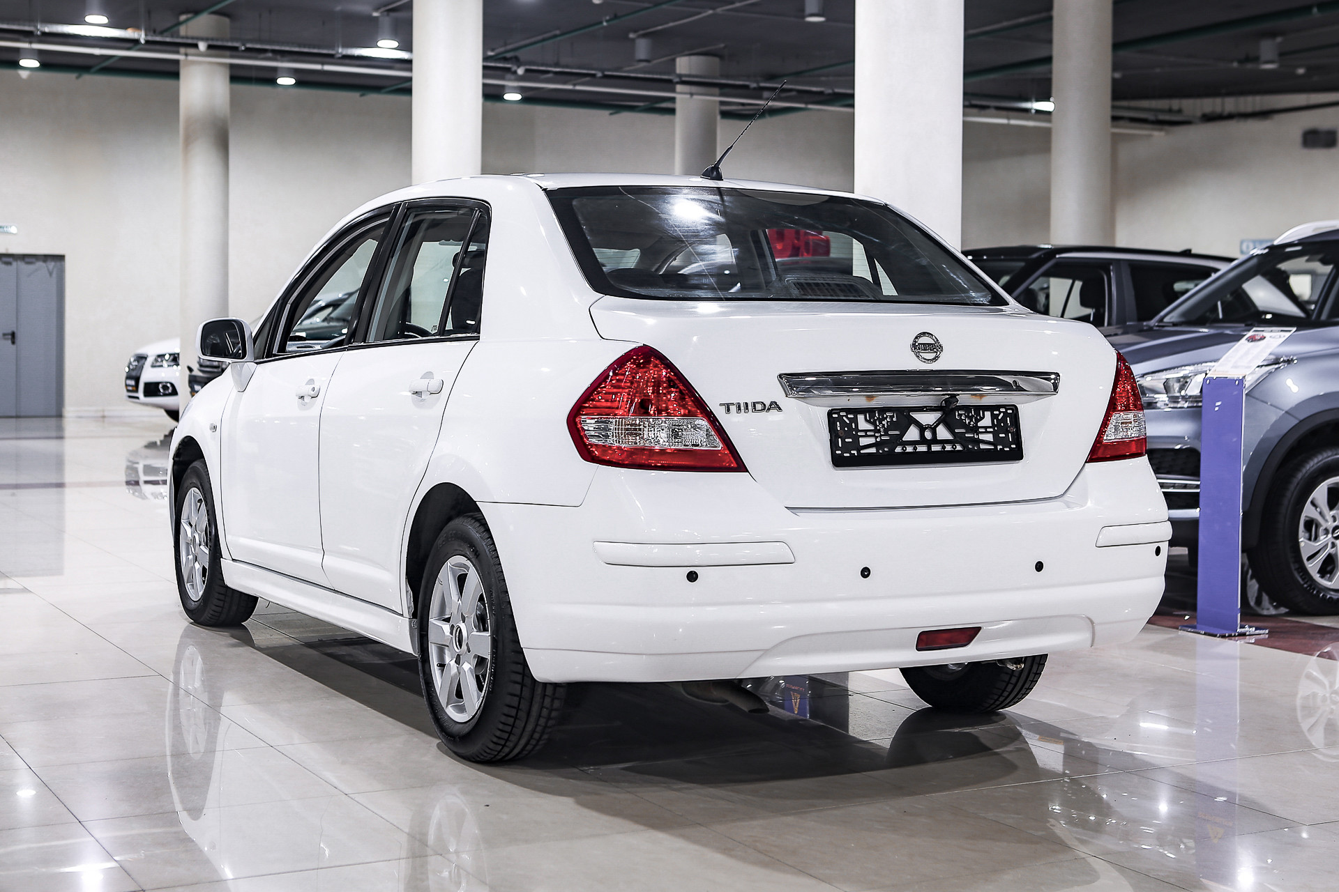 Купить Tiida с пробегом